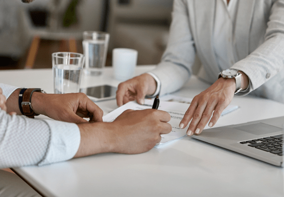 happy-man-his-wife-having-meeting-with-financial-advisor-signing-agreement-office
